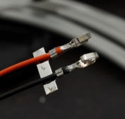 Supply wires with contacts crimped